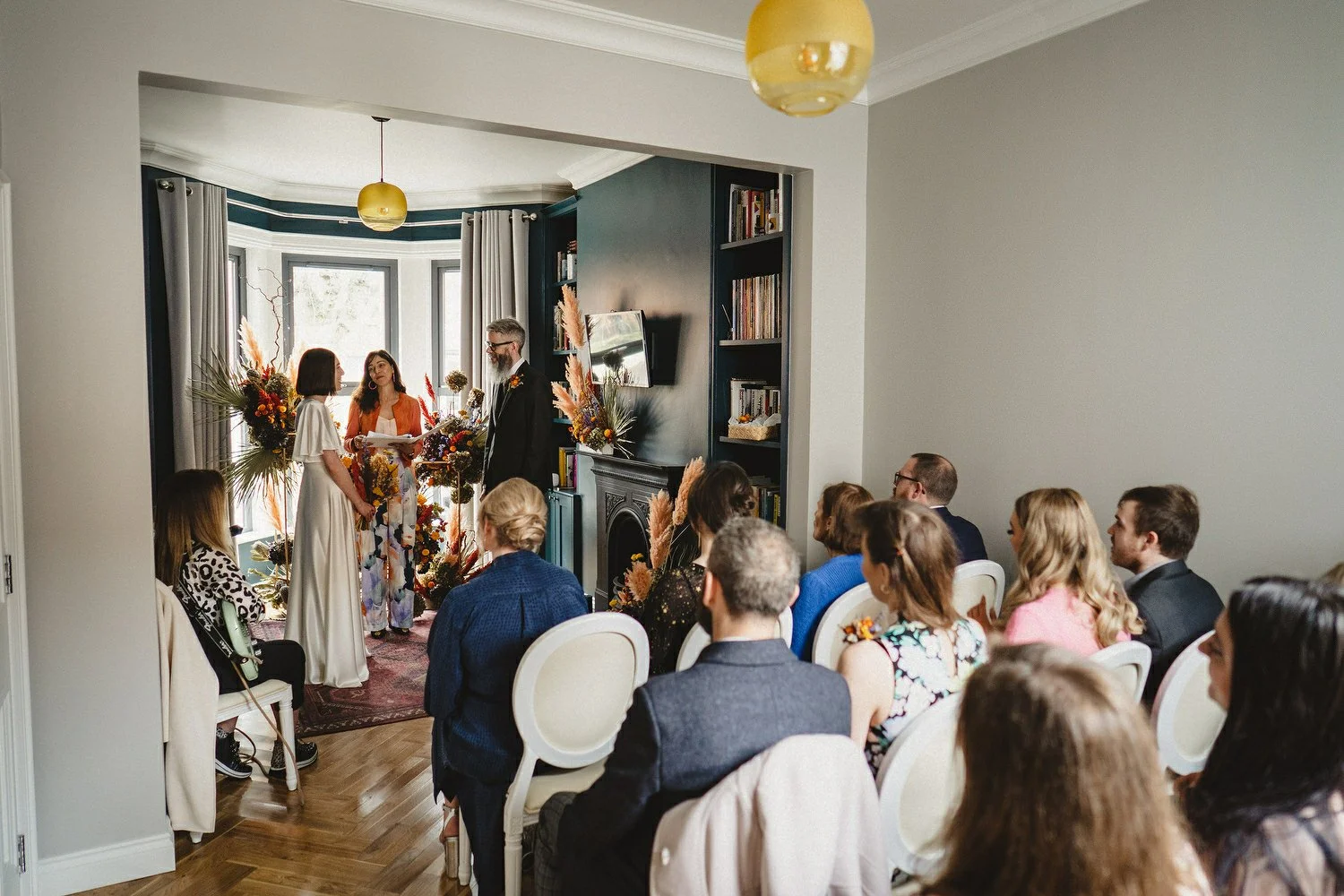  Kathryn and ChrisÕs wedding was supposed to be in Babel rooftop but it burned down 4 days before they were due to get married.  Instead they had their humanist wedding in their own house followed by photos in nearby Ormeau Park and Belfast Cathedral