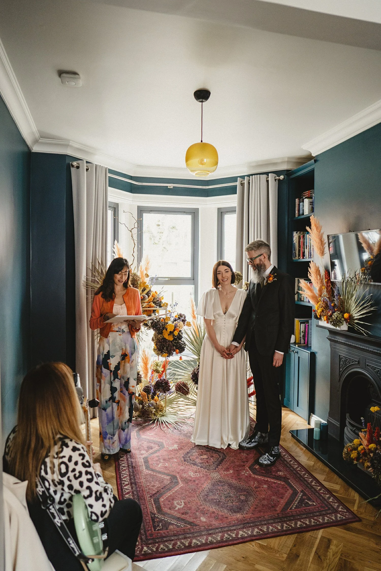  Kathryn and ChrisÕs wedding was supposed to be in Babel rooftop but it burned down 4 days before they were due to get married.  Instead they had their humanist wedding in their own house followed by photos in nearby Ormeau Park and Belfast Cathedral