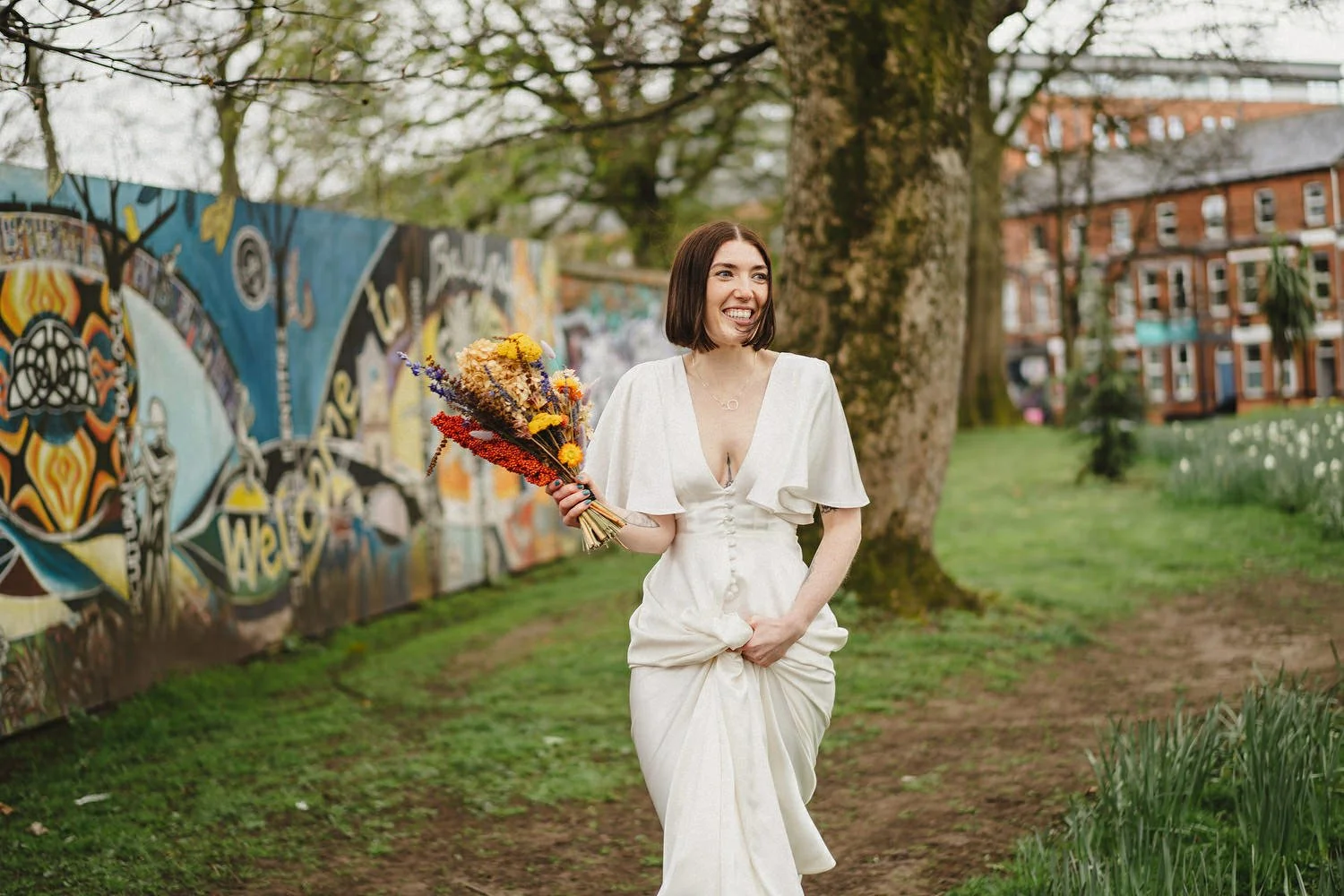 Kathryn and ChrisÕs wedding was supposed to be in Babel rooftop but it burned down 4 days before they were due to get married.  Instead they had their humanist wedding in their own house followed by photos in nearby Ormeau Park and Belfast Cathedral