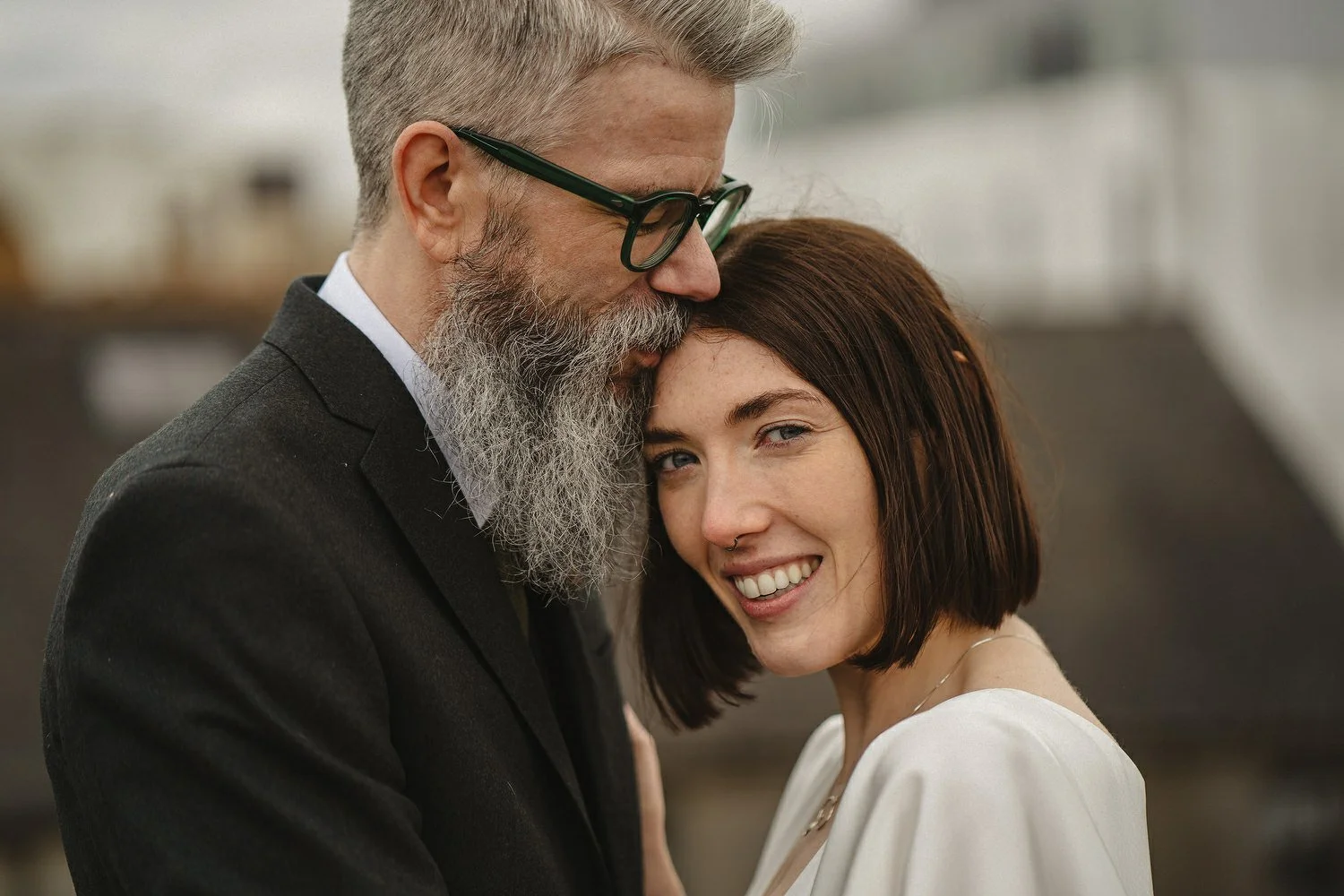  Kathryn and ChrisÕs wedding was supposed to be in Babel rooftop but it burned down 4 days before they were due to get married.  Instead they had their humanist wedding in their own house followed by photos in nearby Ormeau Park and Belfast Cathedral