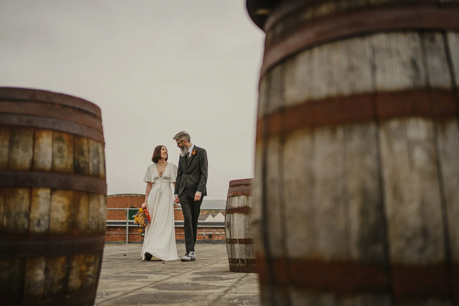  Kathryn and ChrisÕs wedding was supposed to be in Babel rooftop but it burned down 4 days before they were due to get married.  Instead they had their humanist wedding in their own house followed by photos in nearby Ormeau Park and Belfast Cathedral