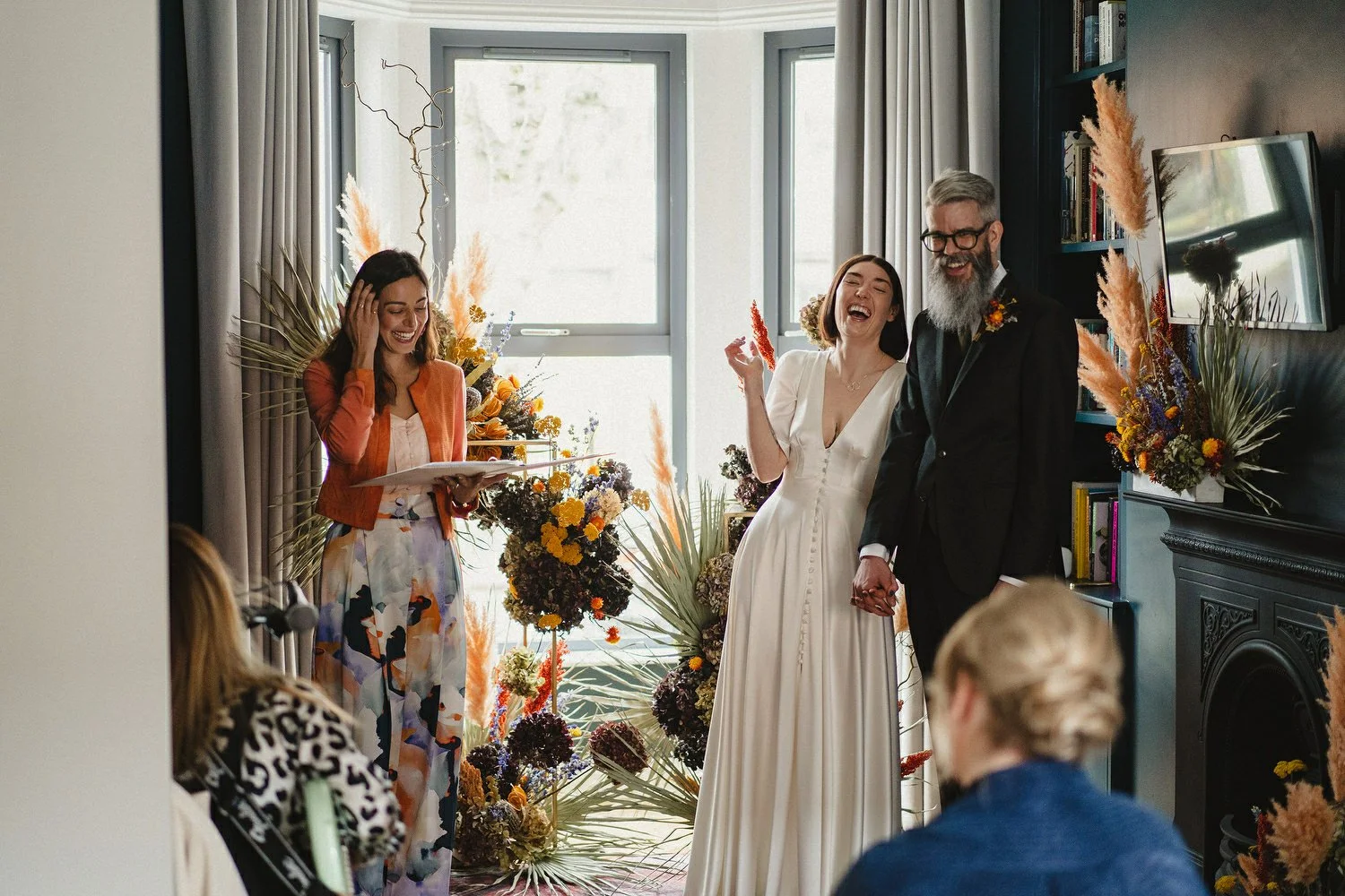  Kathryn and ChrisÕs wedding was supposed to be in Babel rooftop but it burned down 4 days before they were due to get married.  Instead they had their humanist wedding in their own house followed by photos in nearby Ormeau Park and Belfast Cathedral