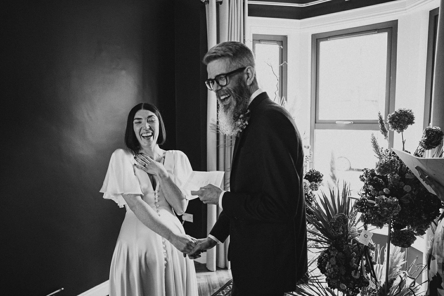  Kathryn and ChrisÕs wedding was supposed to be in Babel rooftop but it burned down 4 days before they were due to get married.  Instead they had their humanist wedding in their own house followed by photos in nearby Ormeau Park and Belfast Cathedral