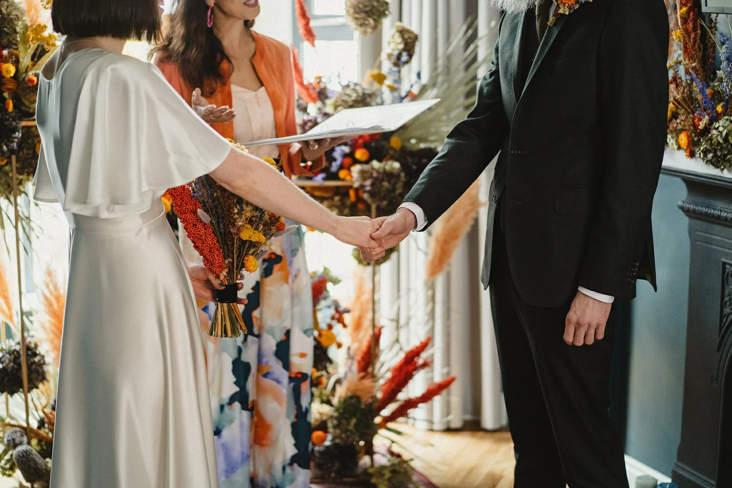  Kathryn and ChrisÕs wedding was supposed to be in Babel rooftop but it burned down 4 days before they were due to get married.  Instead they had their humanist wedding in their own house followed by photos in nearby Ormeau Park and Belfast Cathedral
