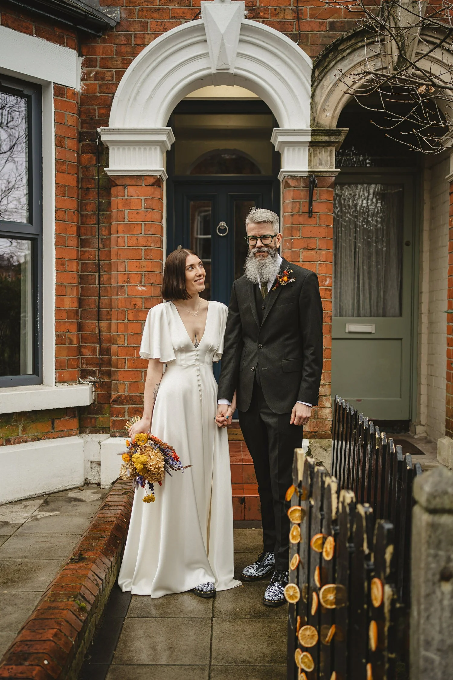  Kathryn and ChrisÕs wedding was supposed to be in Babel rooftop but it burned down 4 days before they were due to get married.  Instead they had their humanist wedding in their own house followed by photos in nearby Ormeau Park and Belfast Cathedral