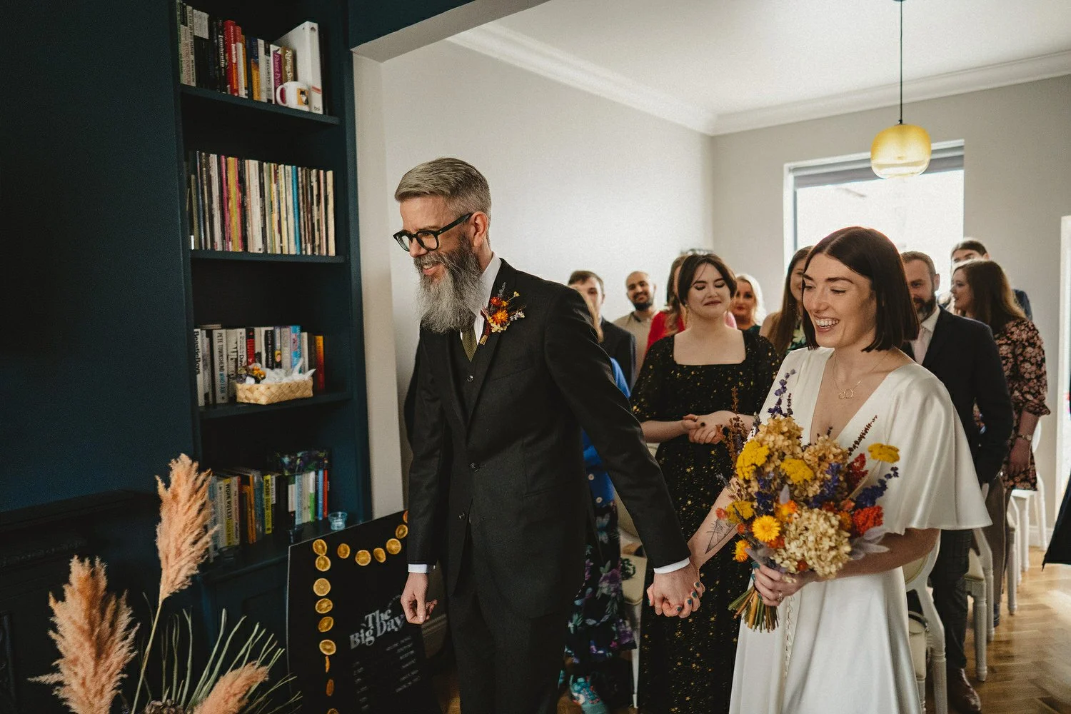  Kathryn and ChrisÕs wedding was supposed to be in Babel rooftop but it burned down 4 days before they were due to get married.  Instead they had their humanist wedding in their own house followed by photos in nearby Ormeau Park and Belfast Cathedral