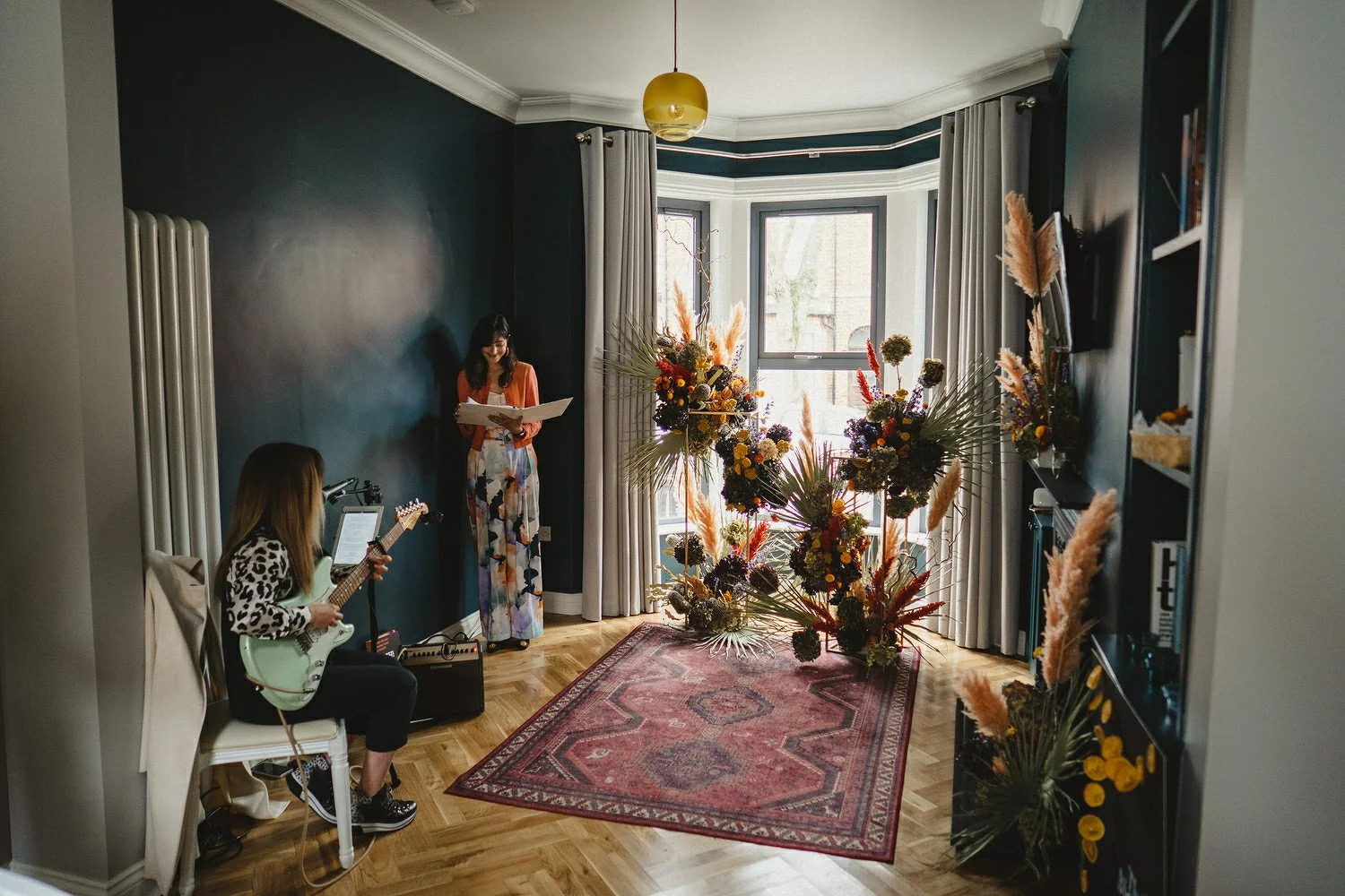  Kathryn and ChrisÕs wedding was supposed to be in Babel rooftop but it burned down 4 days before they were due to get married.  Instead they had their humanist wedding in their own house followed by photos in nearby Ormeau Park and Belfast Cathedral