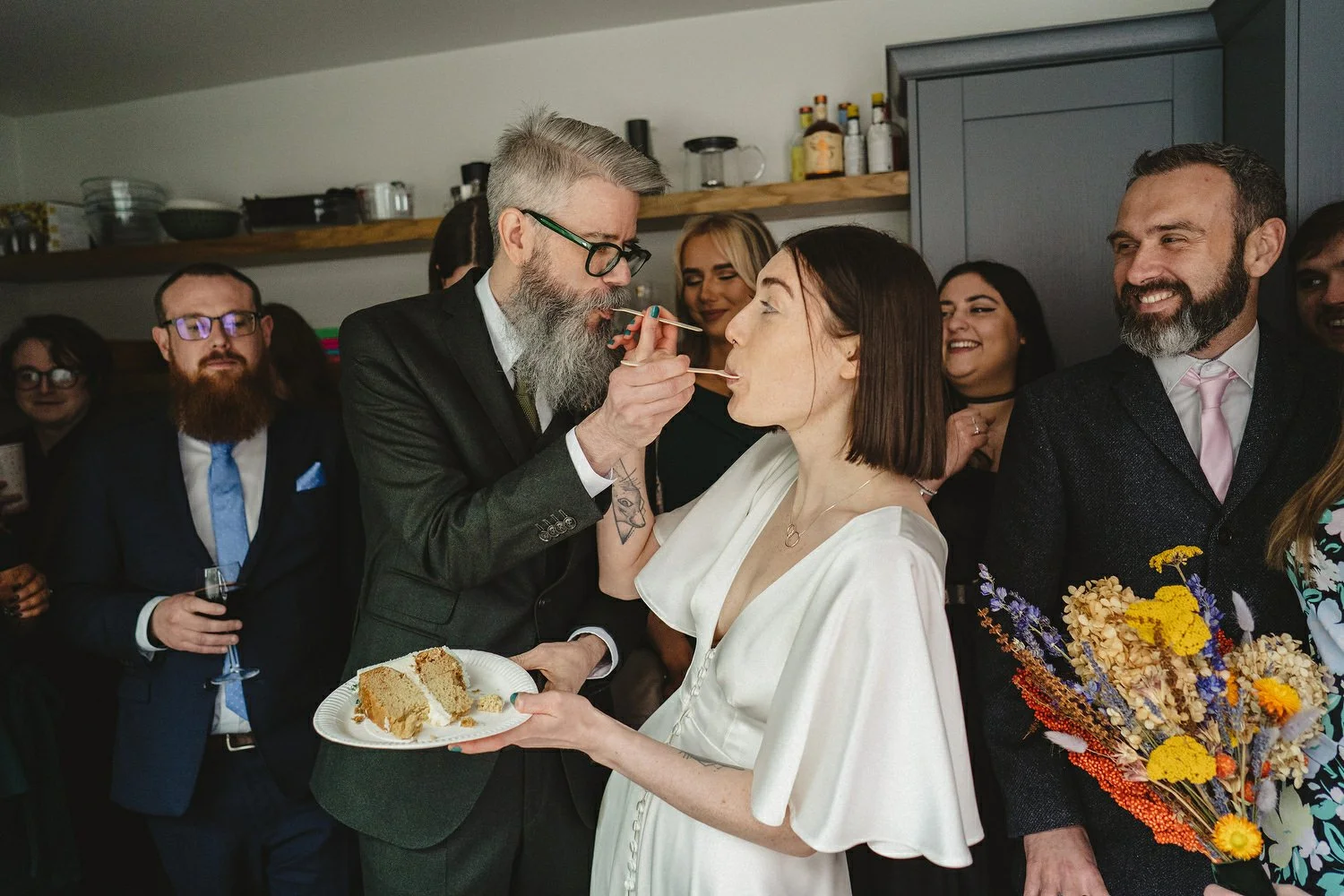  Kathryn and ChrisÕs wedding was supposed to be in Babel rooftop but it burned down 4 days before they were due to get married.  Instead they had their humanist wedding in their own house followed by photos in nearby Ormeau Park and Belfast Cathedral