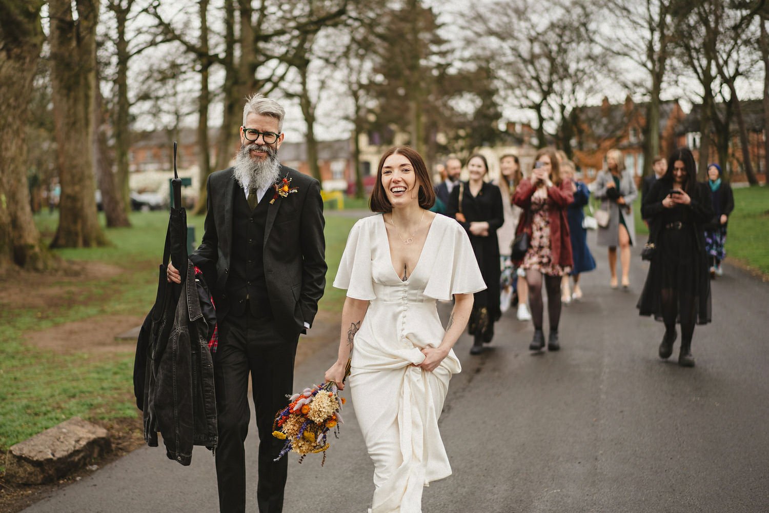  Kathryn and ChrisÕs wedding was supposed to be in Babel rooftop but it burned down 4 days before they were due to get married.  Instead they had their humanist wedding in their own house followed by photos in nearby Ormeau Park and Belfast Cathedral