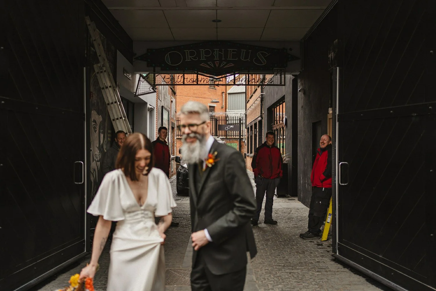  Kathryn and ChrisÕs wedding was supposed to be in Babel rooftop but it burned down 4 days before they were due to get married.  Instead they had their humanist wedding in their own house followed by photos in nearby Ormeau Park and Belfast Cathedral