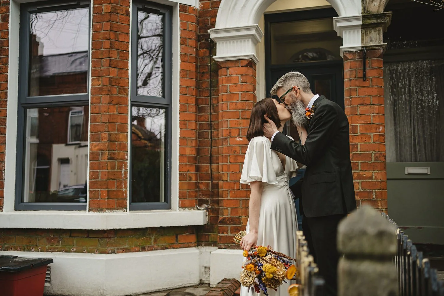  Kathryn and ChrisÕs wedding was supposed to be in Babel rooftop but it burned down 4 days before they were due to get married.  Instead they had their humanist wedding in their own house followed by photos in nearby Ormeau Park and Belfast Cathedral