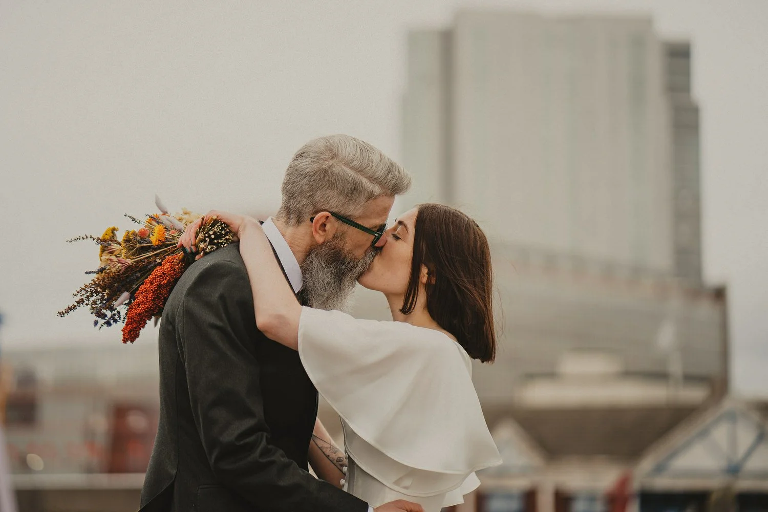  Kathryn and ChrisÕs wedding was supposed to be in Babel rooftop but it burned down 4 days before they were due to get married.  Instead they had their humanist wedding in their own house followed by photos in nearby Ormeau Park and Belfast Cathedral