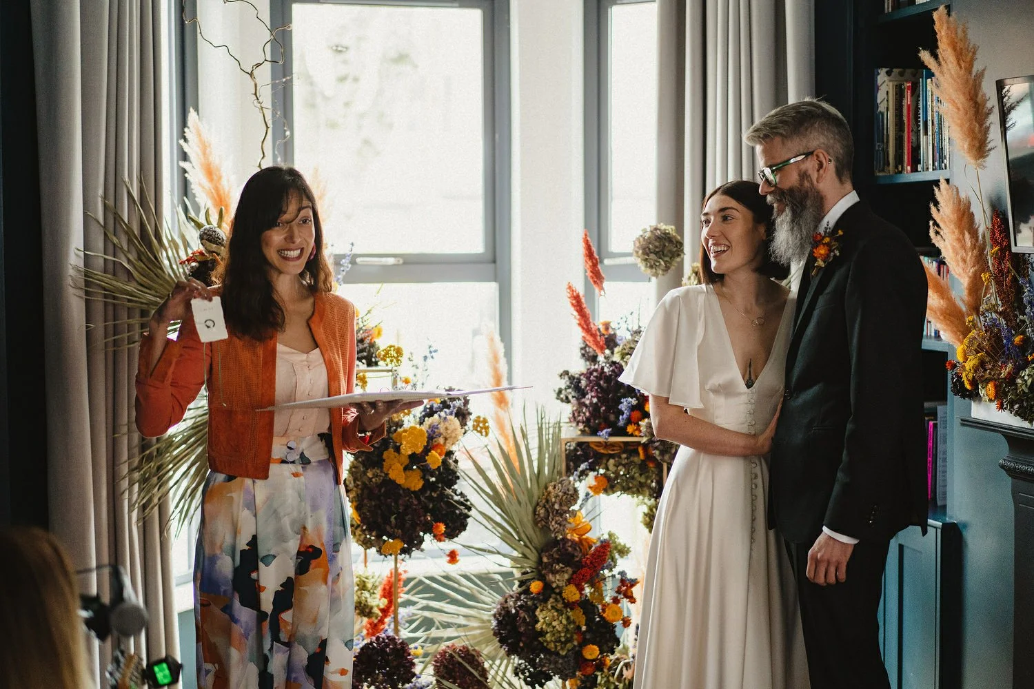  Kathryn and ChrisÕs wedding was supposed to be in Babel rooftop but it burned down 4 days before they were due to get married.  Instead they had their humanist wedding in their own house followed by photos in nearby Ormeau Park and Belfast Cathedral