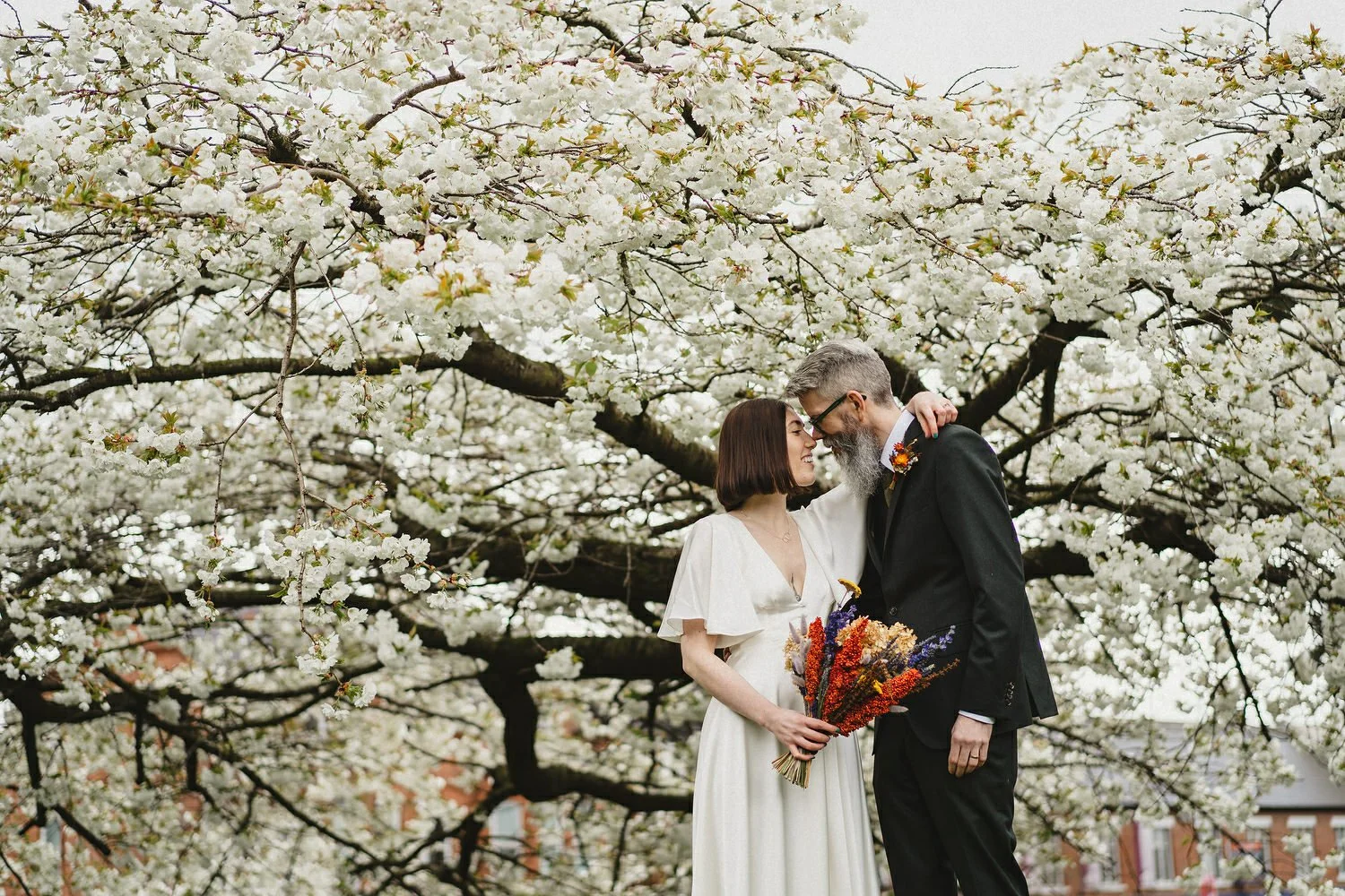  Kathryn and ChrisÕs wedding was supposed to be in Babel rooftop but it burned down 4 days before they were due to get married.  Instead they had their humanist wedding in their own house followed by photos in nearby Ormeau Park and Belfast Cathedral
