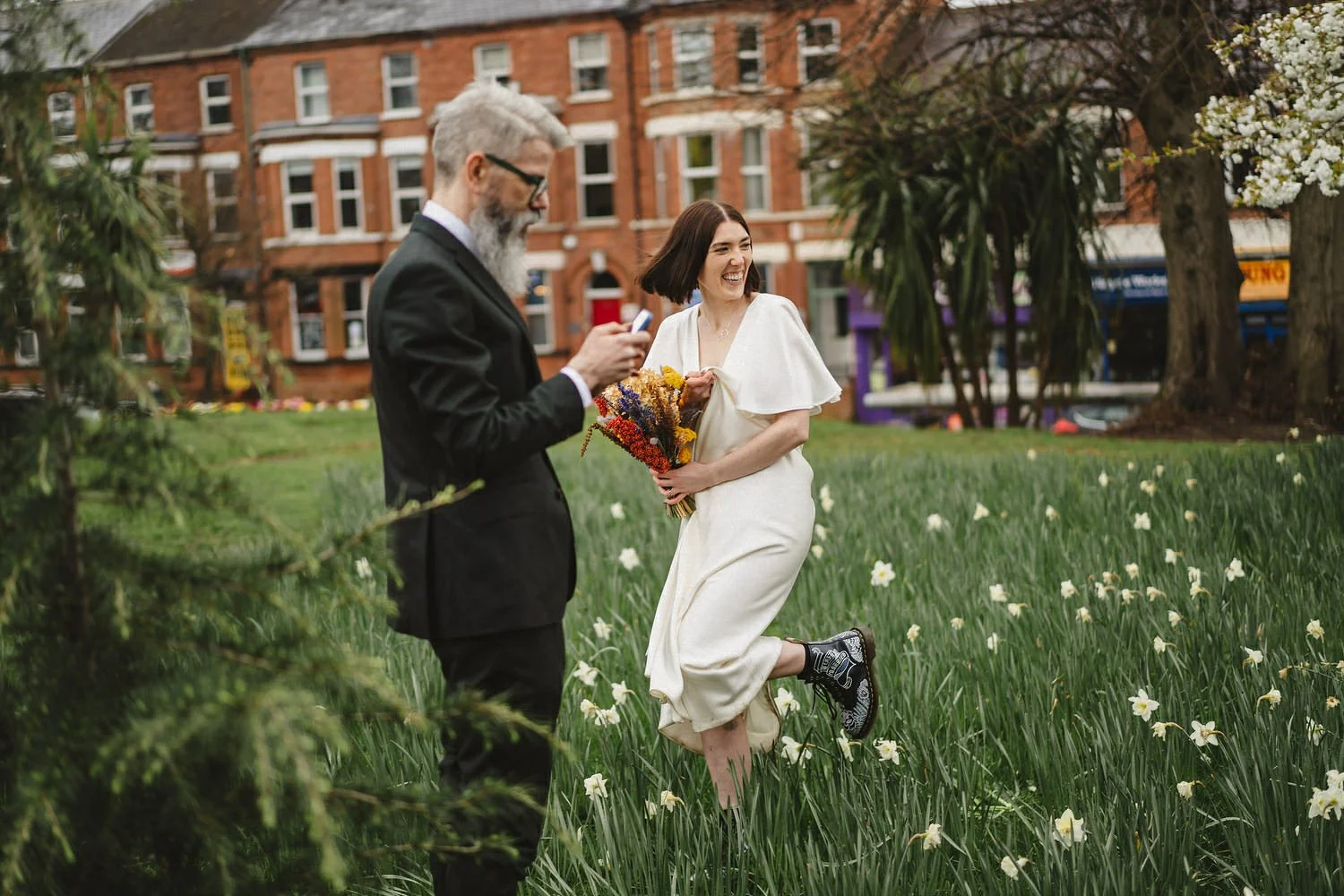  Kathryn and ChrisÕs wedding was supposed to be in Babel rooftop but it burned down 4 days before they were due to get married.  Instead they had their humanist wedding in their own house followed by photos in nearby Ormeau Park and Belfast Cathedral