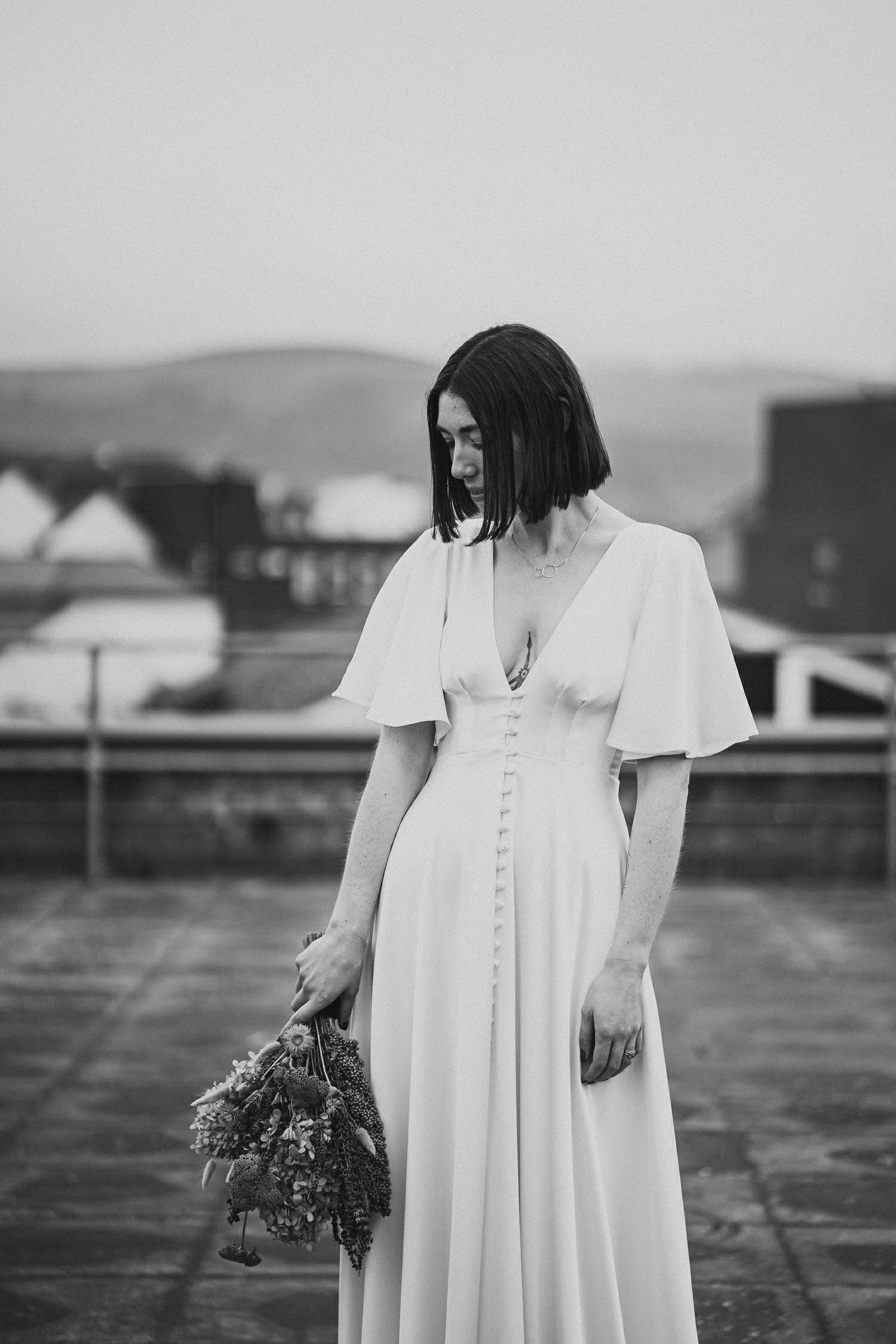  Kathryn and ChrisÕs wedding was supposed to be in Babel rooftop but it burned down 4 days before they were due to get married.  Instead they had their humanist wedding in their own house followed by photos in nearby Ormeau Park and Belfast Cathedral