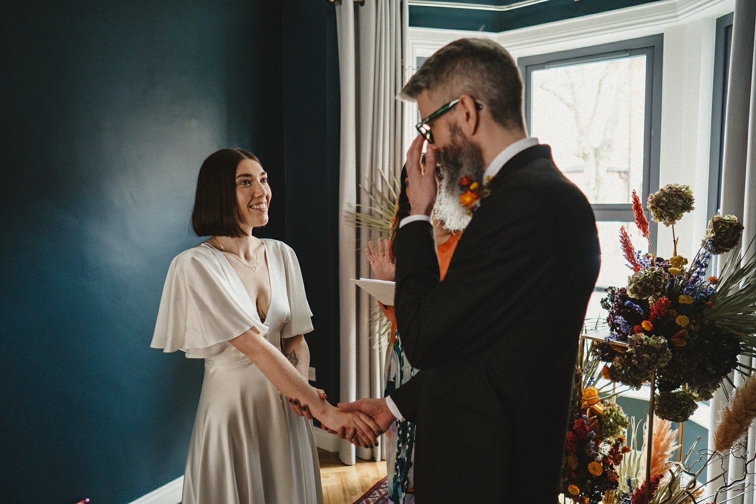  Kathryn and ChrisÕs wedding was supposed to be in Babel rooftop but it burned down 4 days before they were due to get married.  Instead they had their humanist wedding in their own house followed by photos in nearby Ormeau Park and Belfast Cathedral