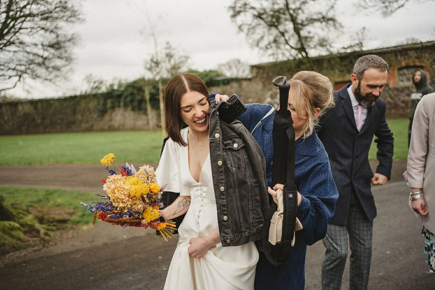  Kathryn and ChrisÕs wedding was supposed to be in Babel rooftop but it burned down 4 days before they were due to get married.  Instead they had their humanist wedding in their own house followed by photos in nearby Ormeau Park and Belfast Cathedral