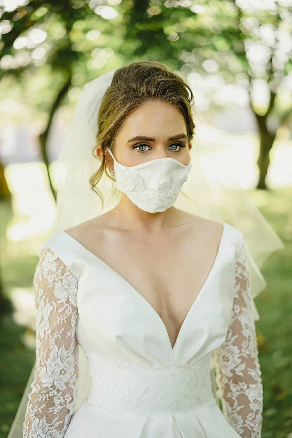 Bride wearing a mask at a wedding.JPG