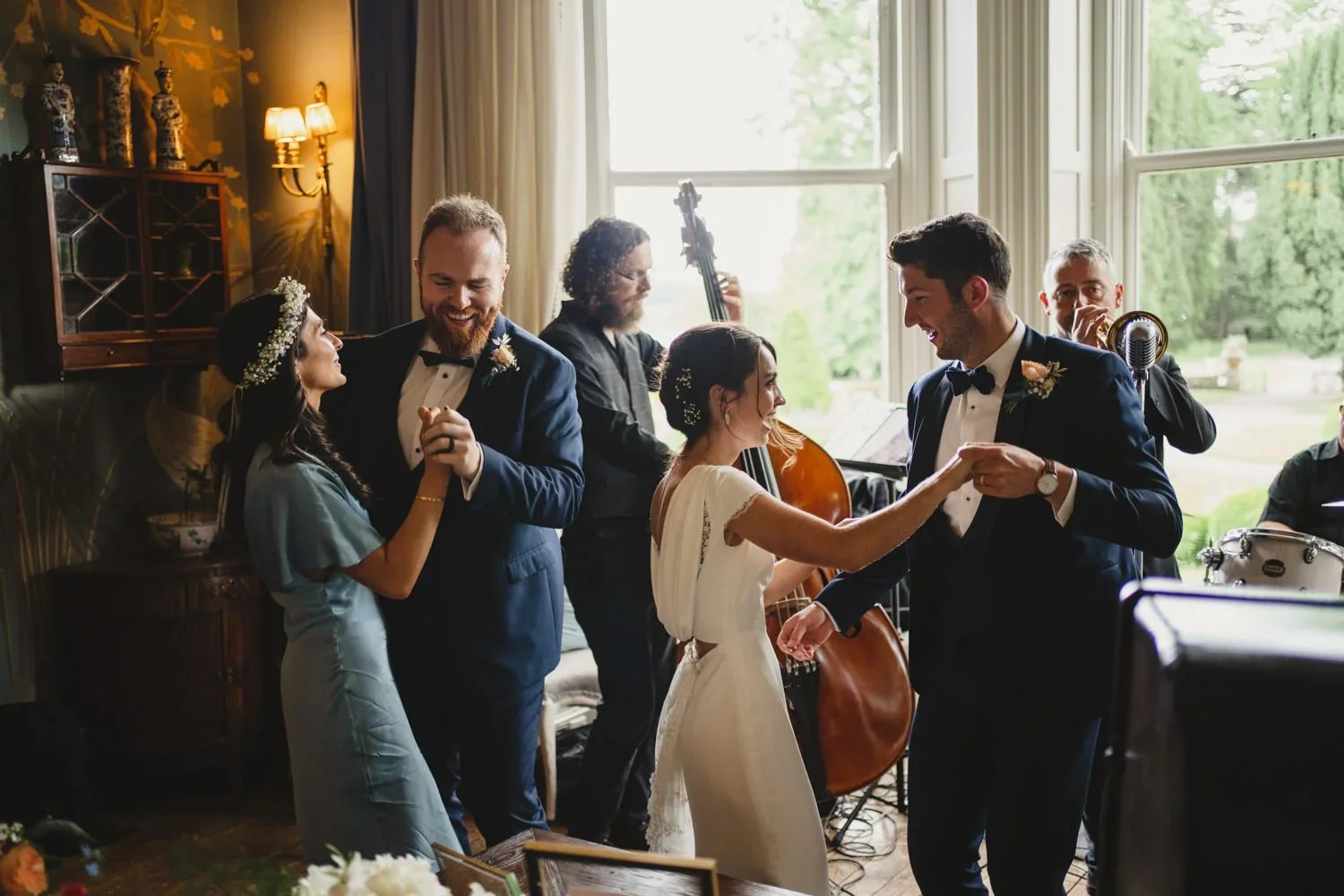 A bride and groom dance to a Jazz band at Castle Leslie