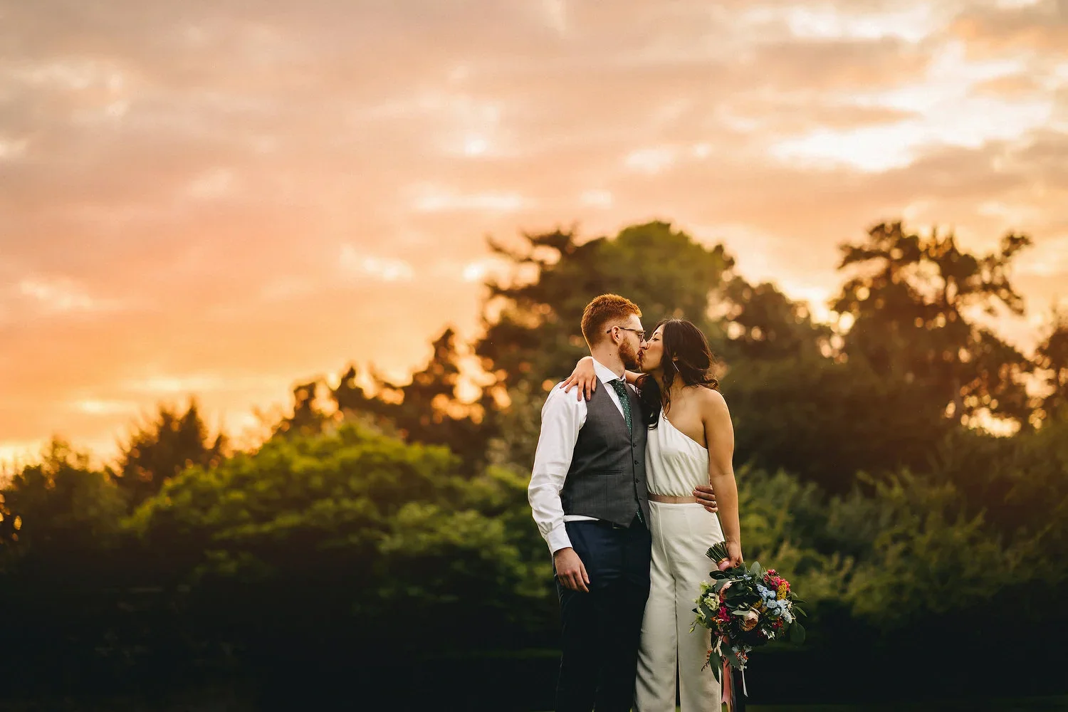 Golden hour wedding portrait at Larchfield estate with sunset