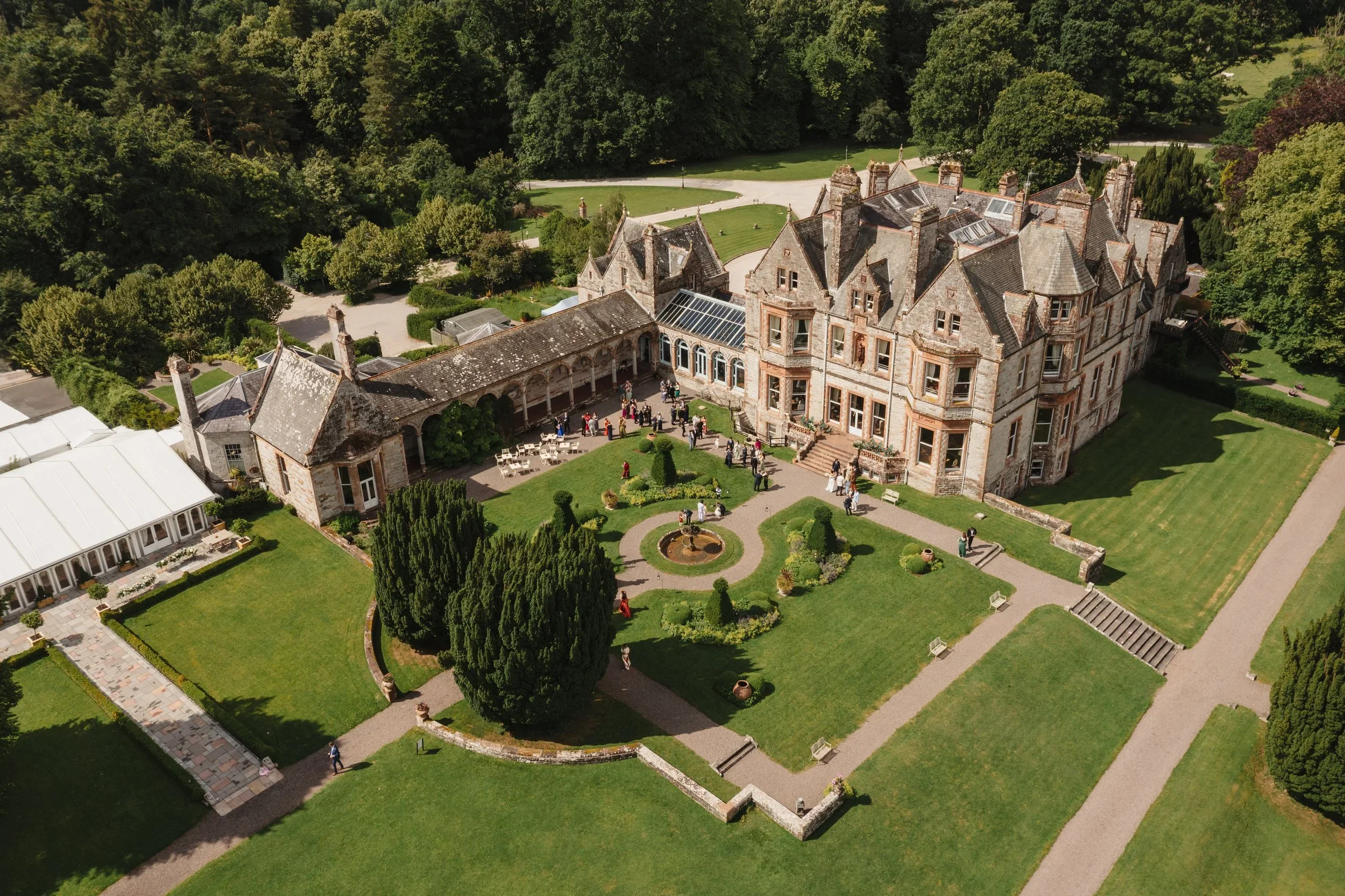 A aerial drone shot of Castle Leslie during a summer wedding