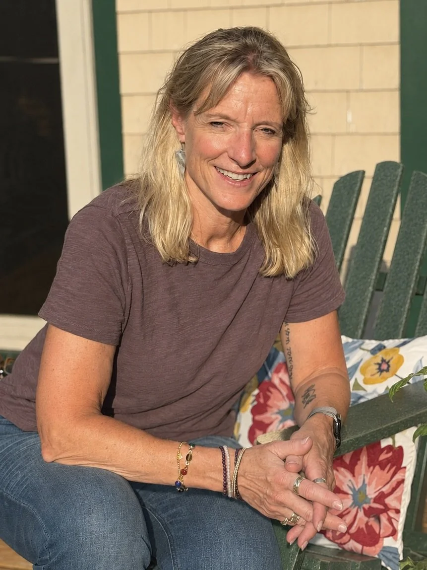 Smiling birth doula on a sunny day in Maine