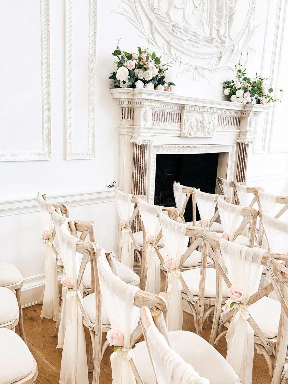 The dreamiest ceremony setup 🤍🌸

Soft blush tones, delicate rose details, flowing chair drapes, and the most beautiful luxury faux florals transformed this space at @rockbeare_manor_ into something truly magical.

Absolutely obsessed with the gorge