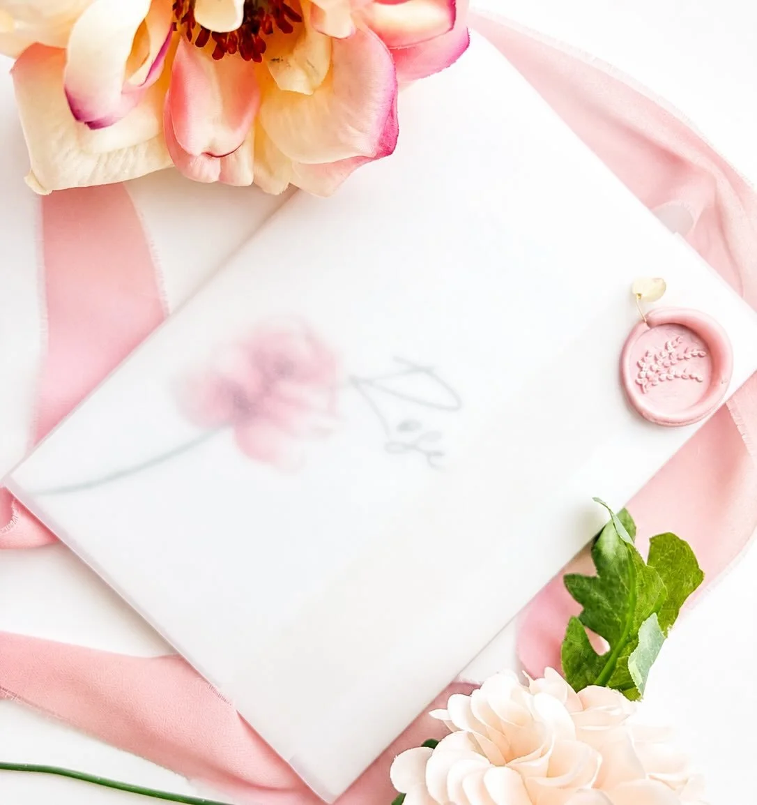 Every detail tells part of your story 🤍

From delicate vellum wraps and silk ribbon to handwritten place cards and wax seals, our bespoke wedding stationery is designed to feel just as special as the day itself.

Each piece is thoughtfully created i