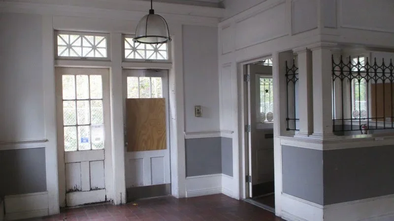 Falmouth-Station-Exterior-Original-Back-Door.webp