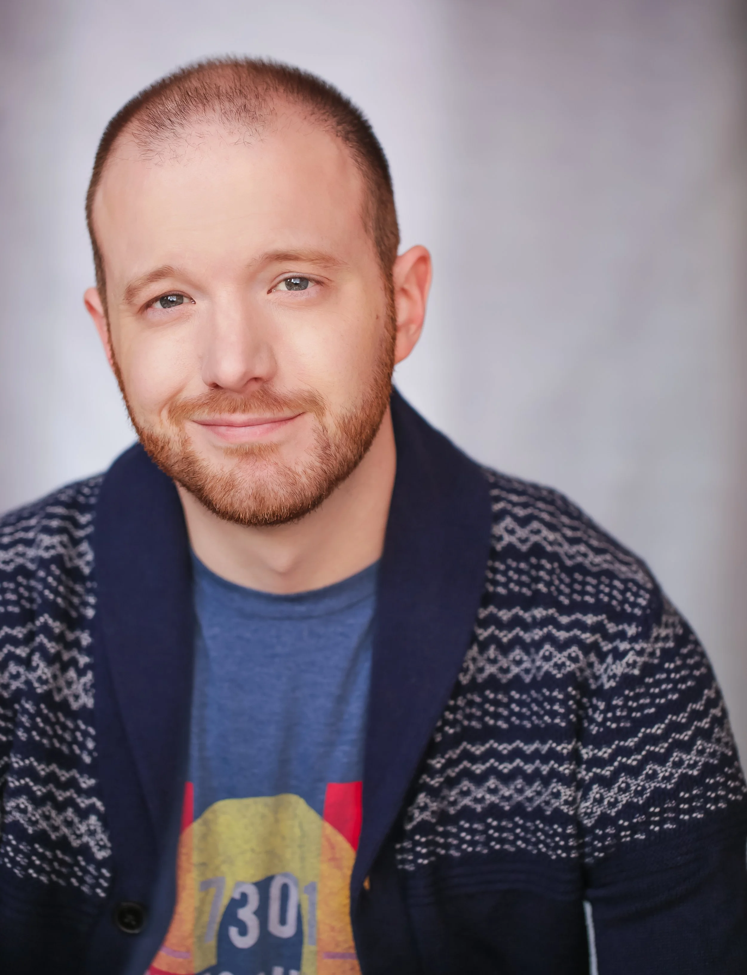 A headshot photo of Chicago voice actor Thor McGinnis