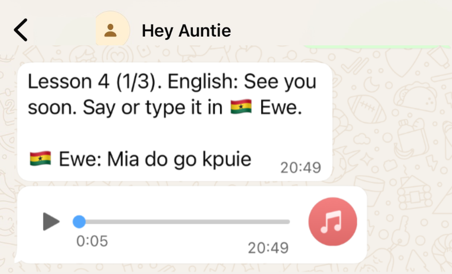 Screenshot of a WhatsApp chat with a message in English and Ewe language, including an audio playback button.