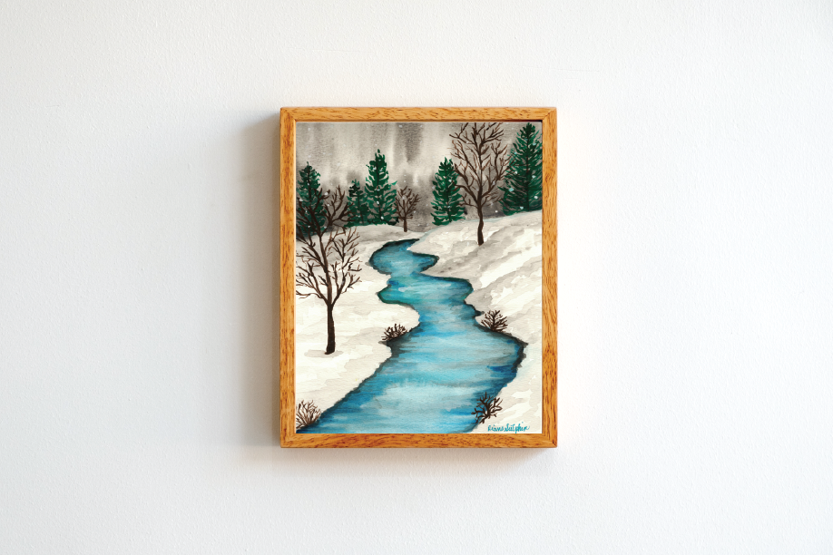 Painting of a winter landscape featuring a winding river, snow-covered banks, leafless trees, and evergreen trees in the background, framed in a wooden frame.