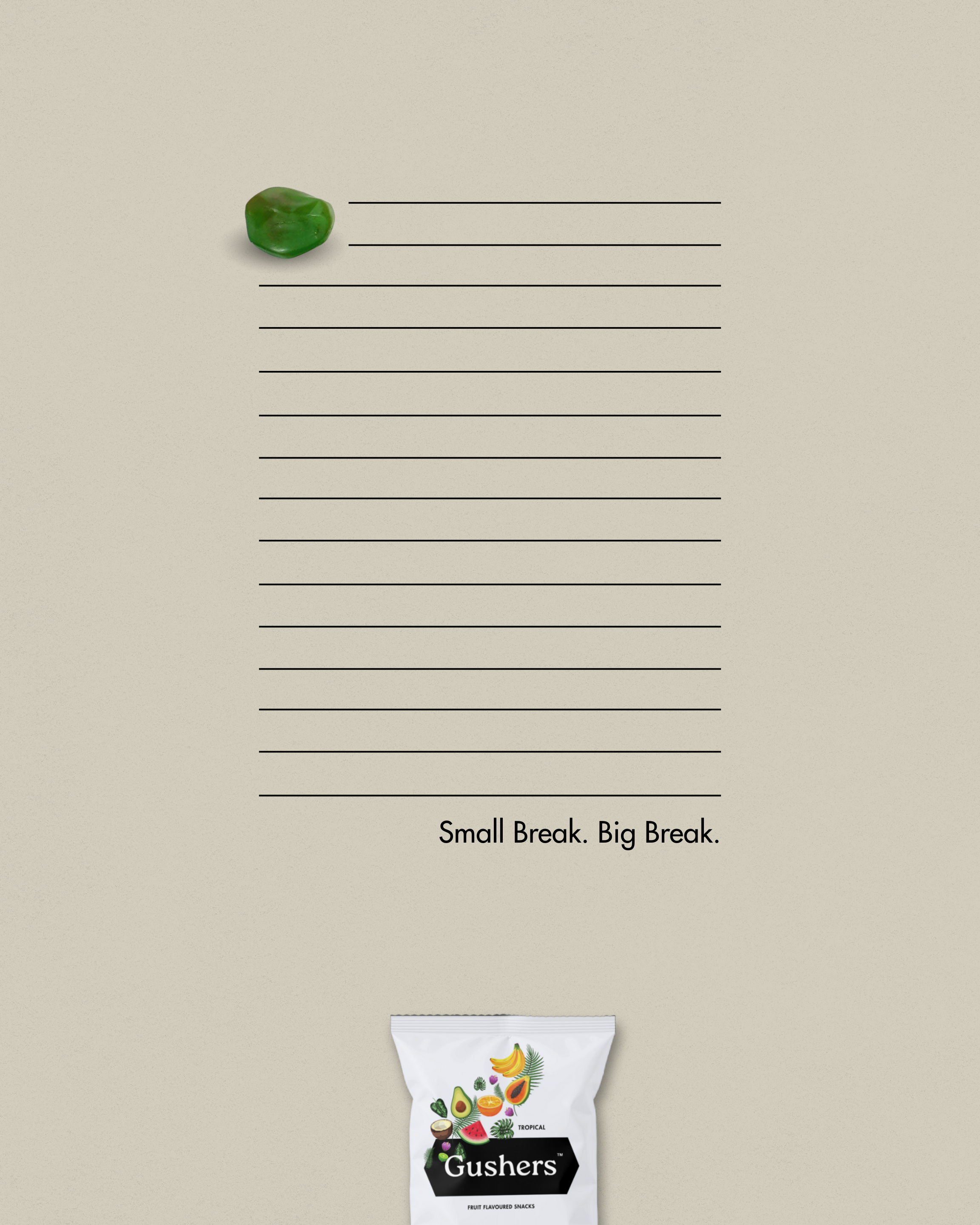 Ad featuring a single Gushers fruit snack placed on lined notebook paper, resembling a small, study-time distraction.