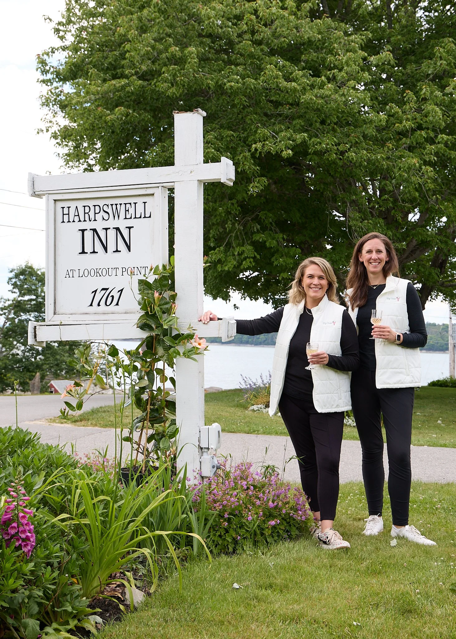 2026.06.21_Sara and Abby at Harpswell Inn Sign.jpg