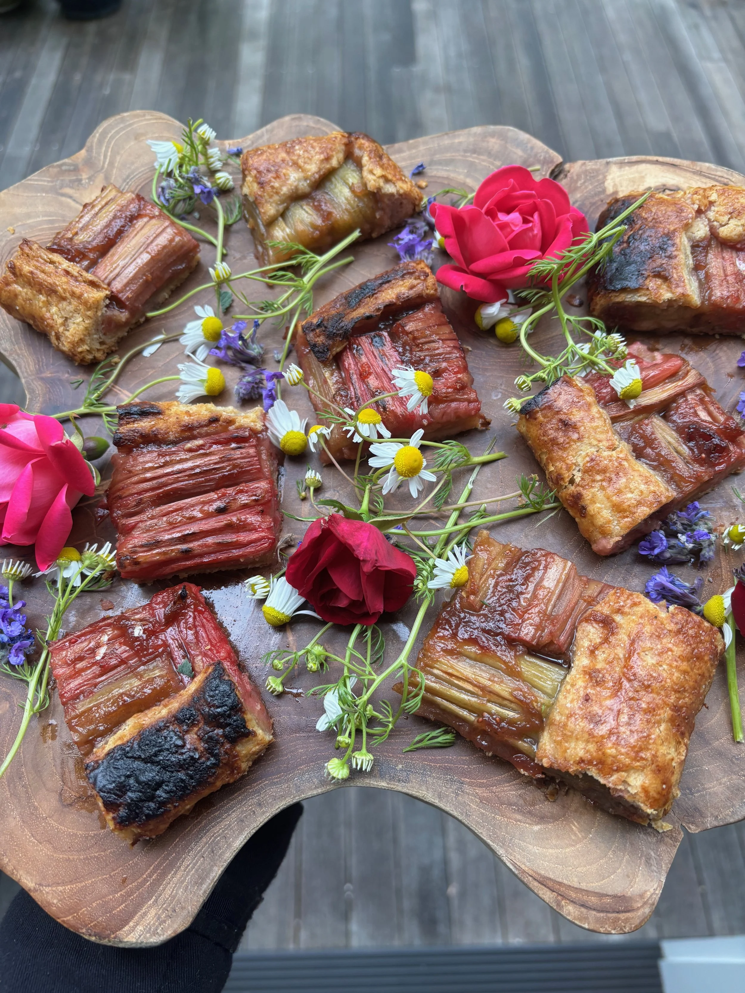 Rhubarb galette sweet appetizer for a birthday party in Chilmark, garnished with wild flowers