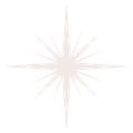 A star-shaped light burst that is a very light shad of pink.