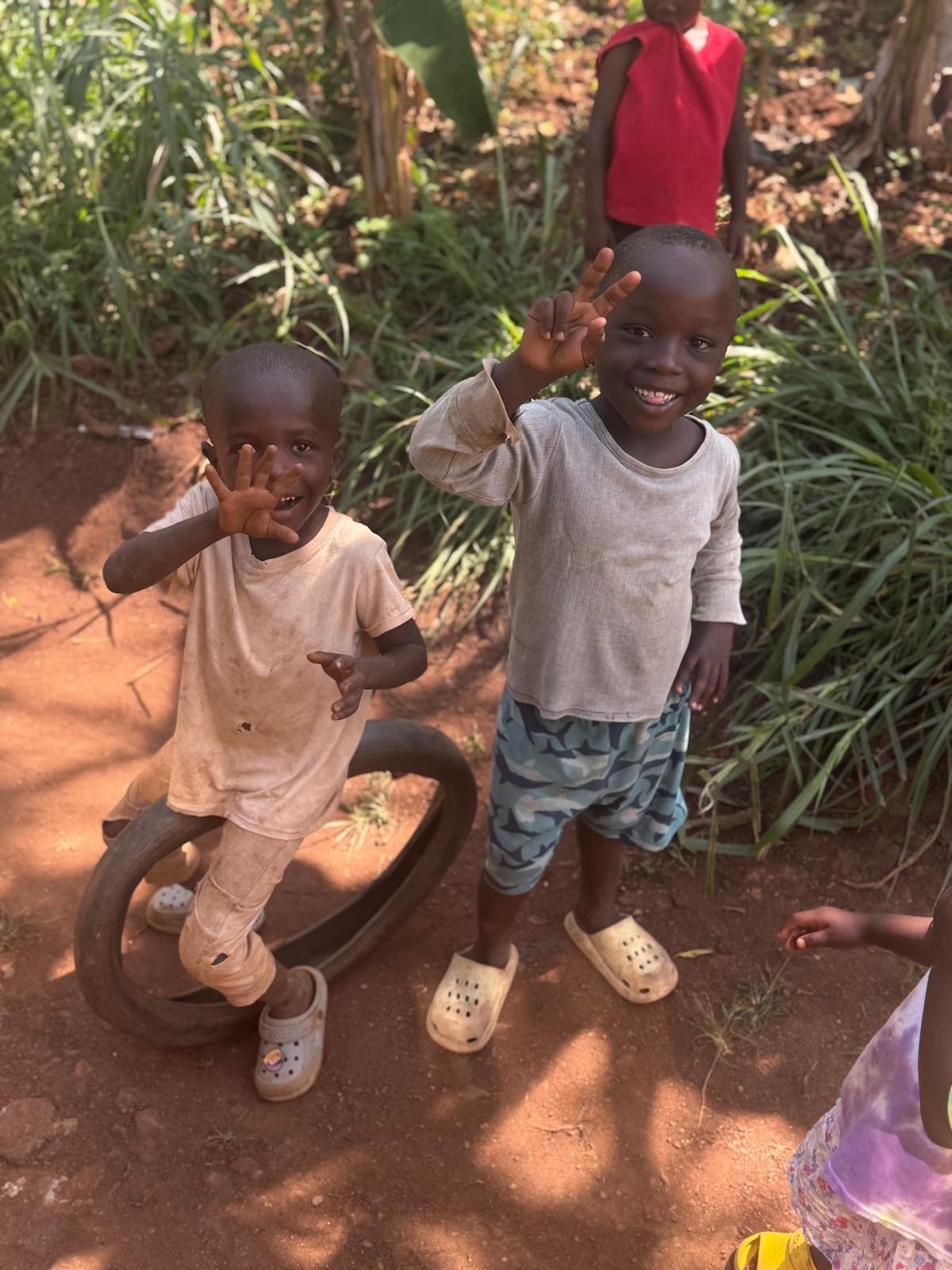 AIF - Wave and Peace, Two kids one waving, one doing the peace sign