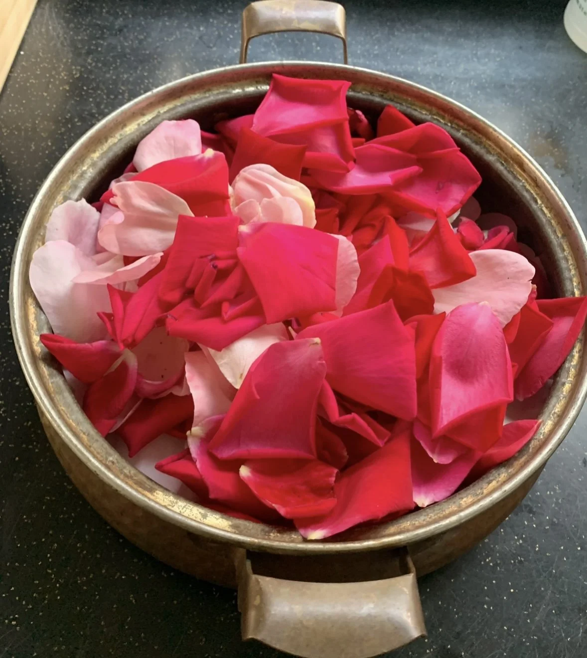 Small-batch rosewater ingredients — organic rose petals