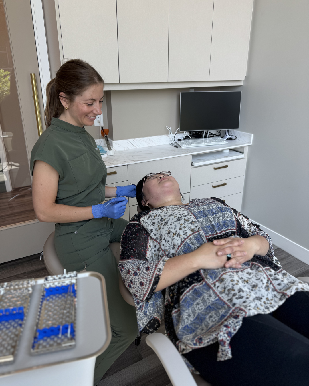 Ottawa Dentist Dr Amanda Campbell doing an Invisalign consult before back to school