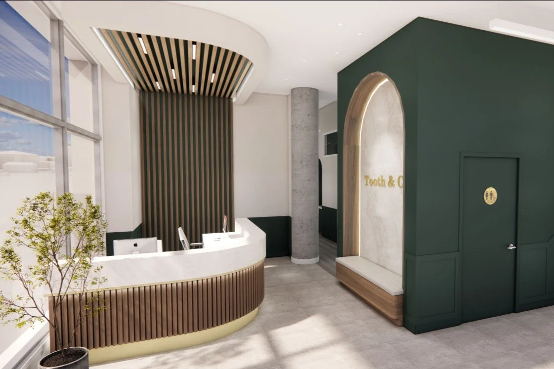 Interior of Tooth & Co. dental clinic in Centretown West Ottawa, featuring deep green walls, gold accents, and a warm botanical wallpaper in the reception area.