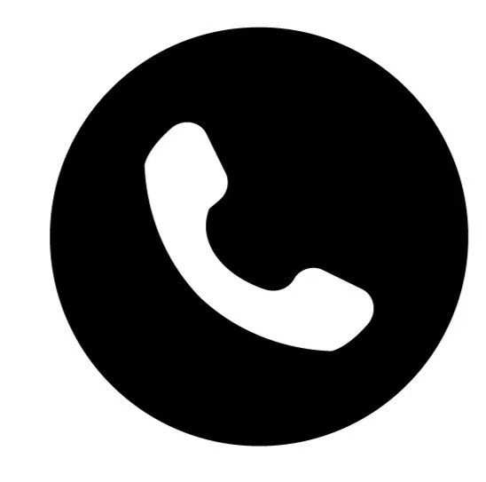 Black circle with a white telephone receiver icon in the center.