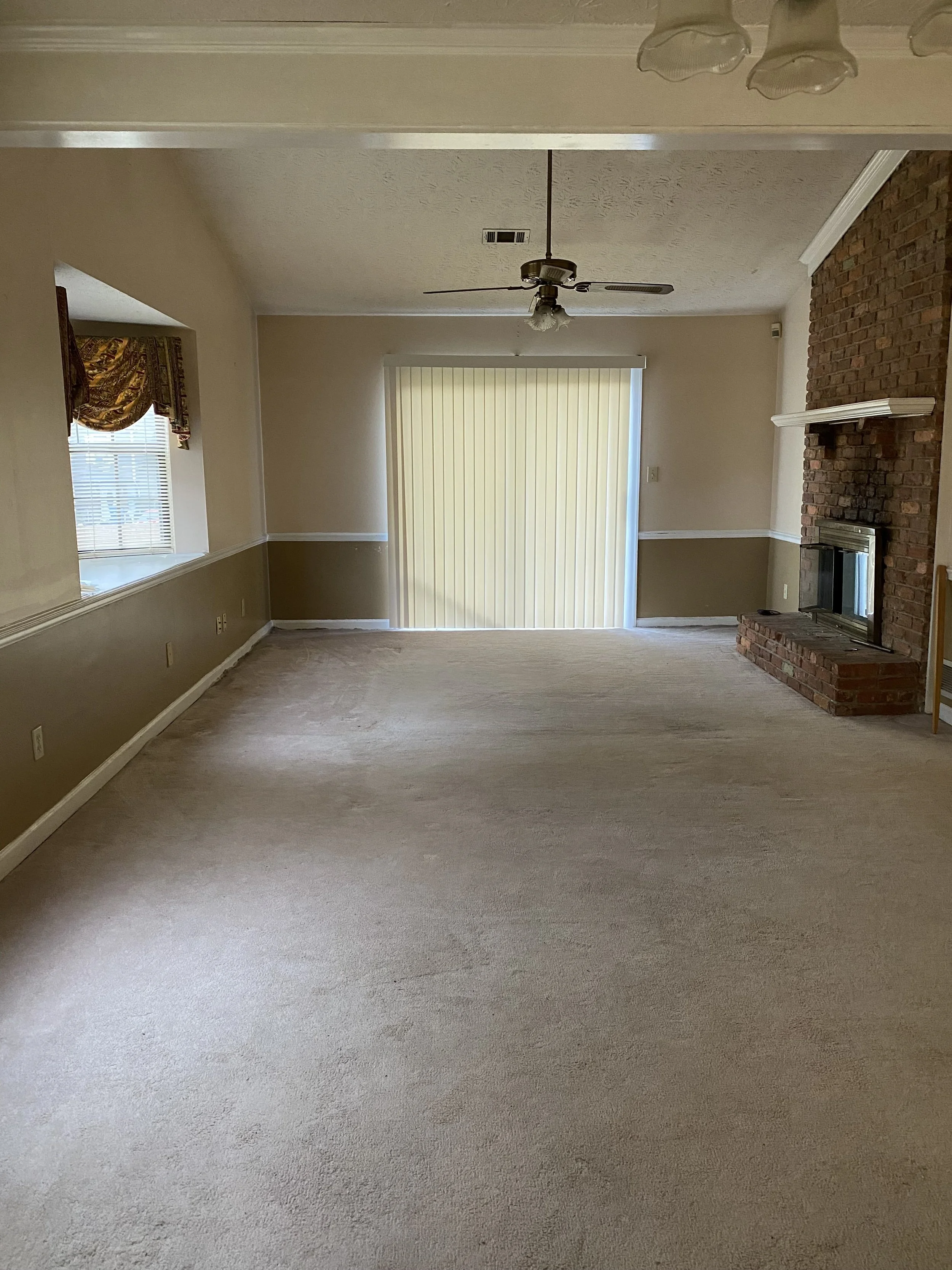 Outdated Living Space Prior to Renovation