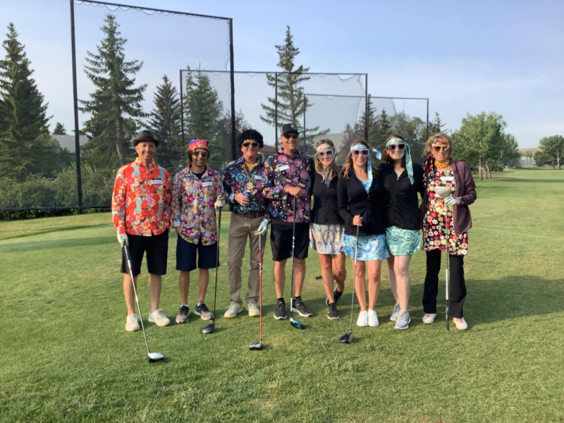 Larry Woolliams and guests enjoying the Annual Woolliams Farms Ltd. Charity Golf Classic.