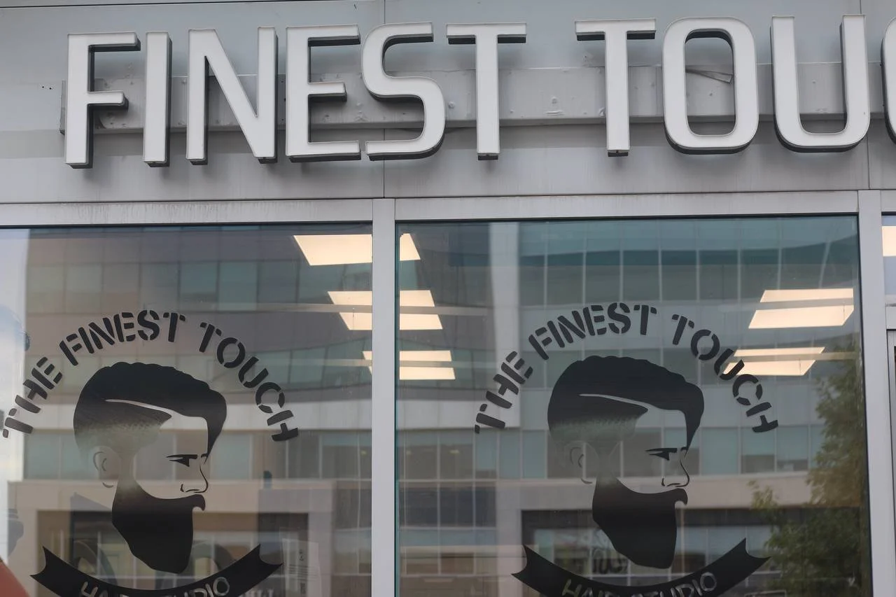 Exterior storefront of Finest Touch grooming studio.
