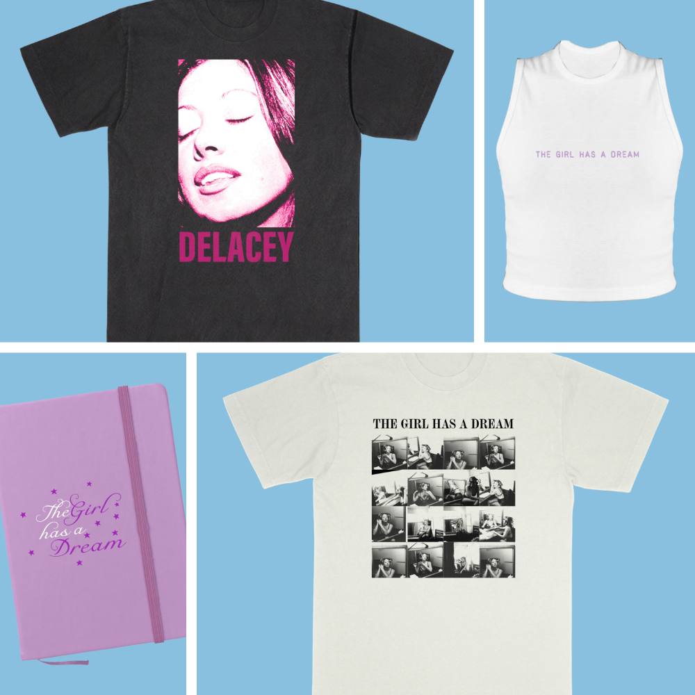 Collection of clothing and accessories featuring designs inspired by the phrase "The Girl Has a Dream." Includes a black T-shirt with a pink photo of a woman and the name "Delacey," a white sleeveless top with the phrase "The Girl Has a Dream," a white T-shirt with multiple black and white photos and the phrase "The Girl Has a Dream," and a purple notebook with the phrase and stars.