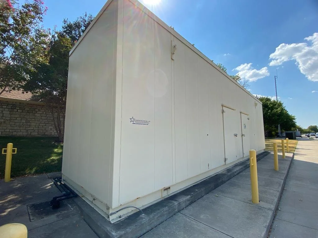 Completed industrial modular building installed on-site, demonstrating final assembly, foundation interface, and utility integration conditions.