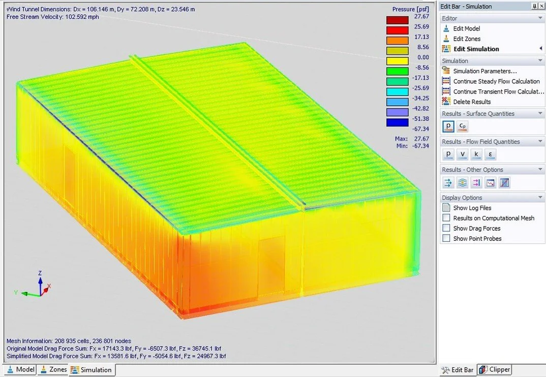Wind pressure contour analysis indicating positive and negative pressure distribution across wall and roof surfaces under design wind conditions.