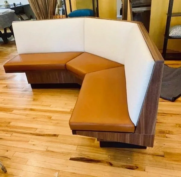 Upholstered with leather seat and fabric back