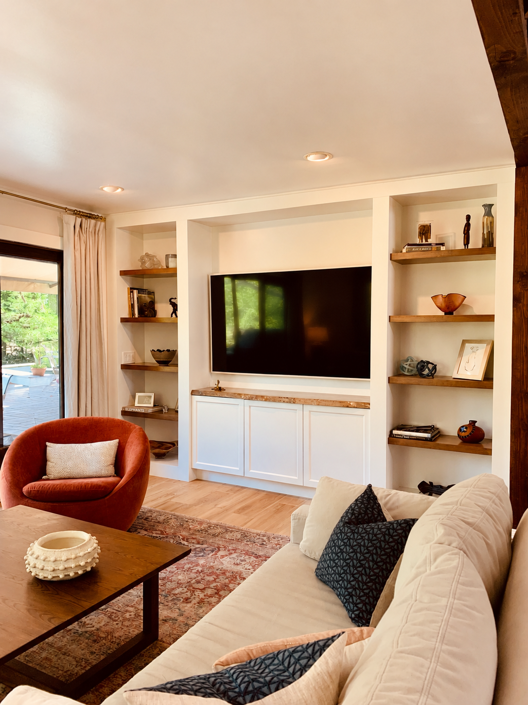 living room custom build in shelving colorful warm inviiting design.PNG